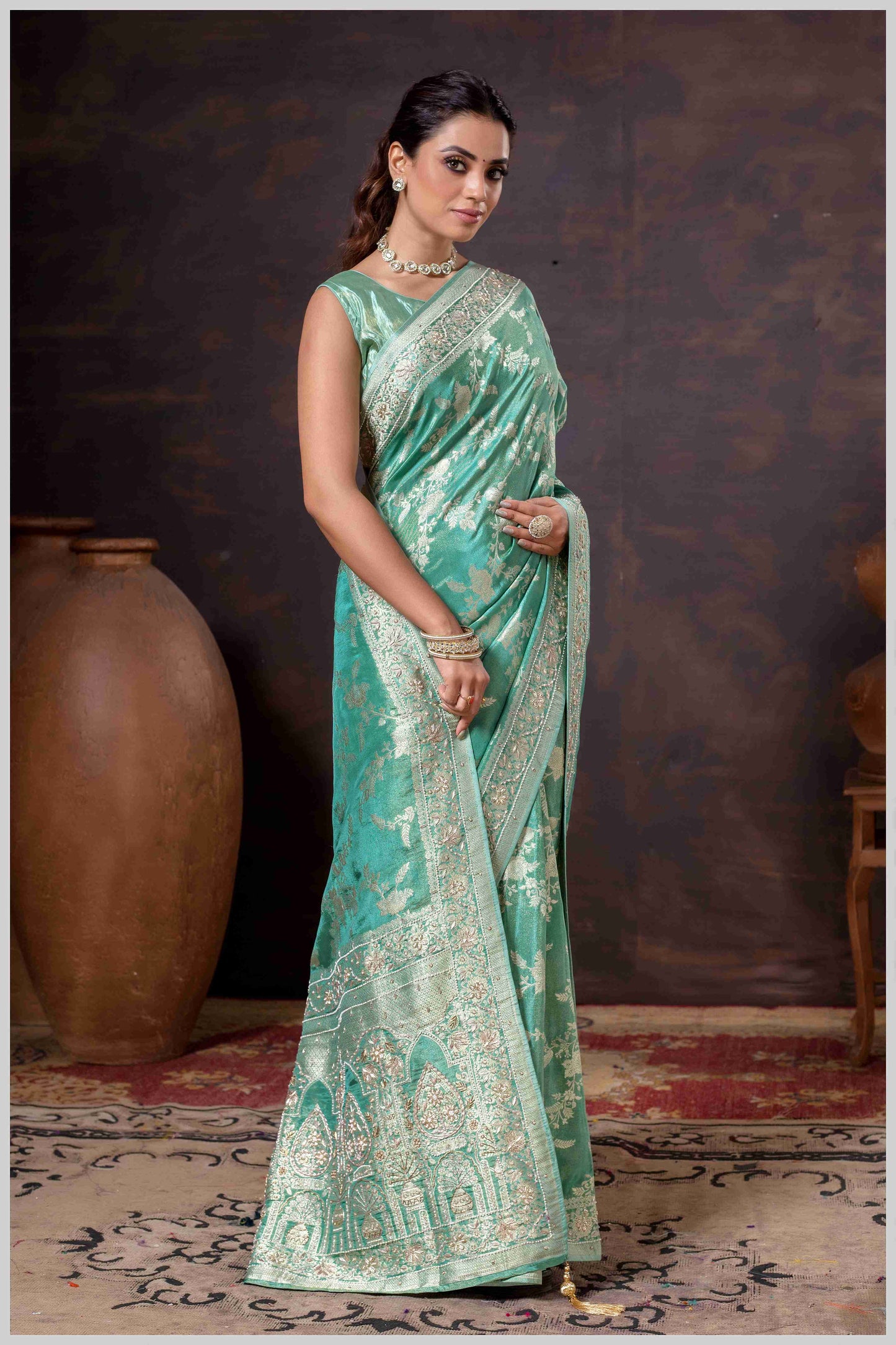 Grace in Bloom: Aqua Green Tissue Saree with Woven Floral Vines