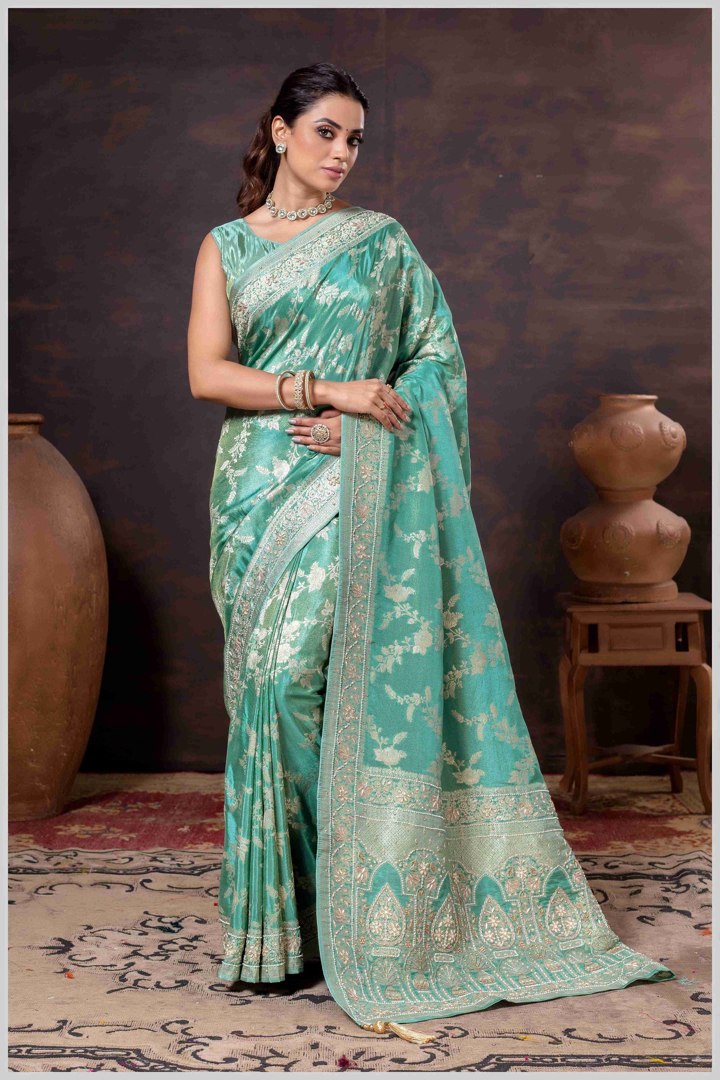 Grace in Bloom: Aqua Green Tissue Saree with Woven Floral Vines
