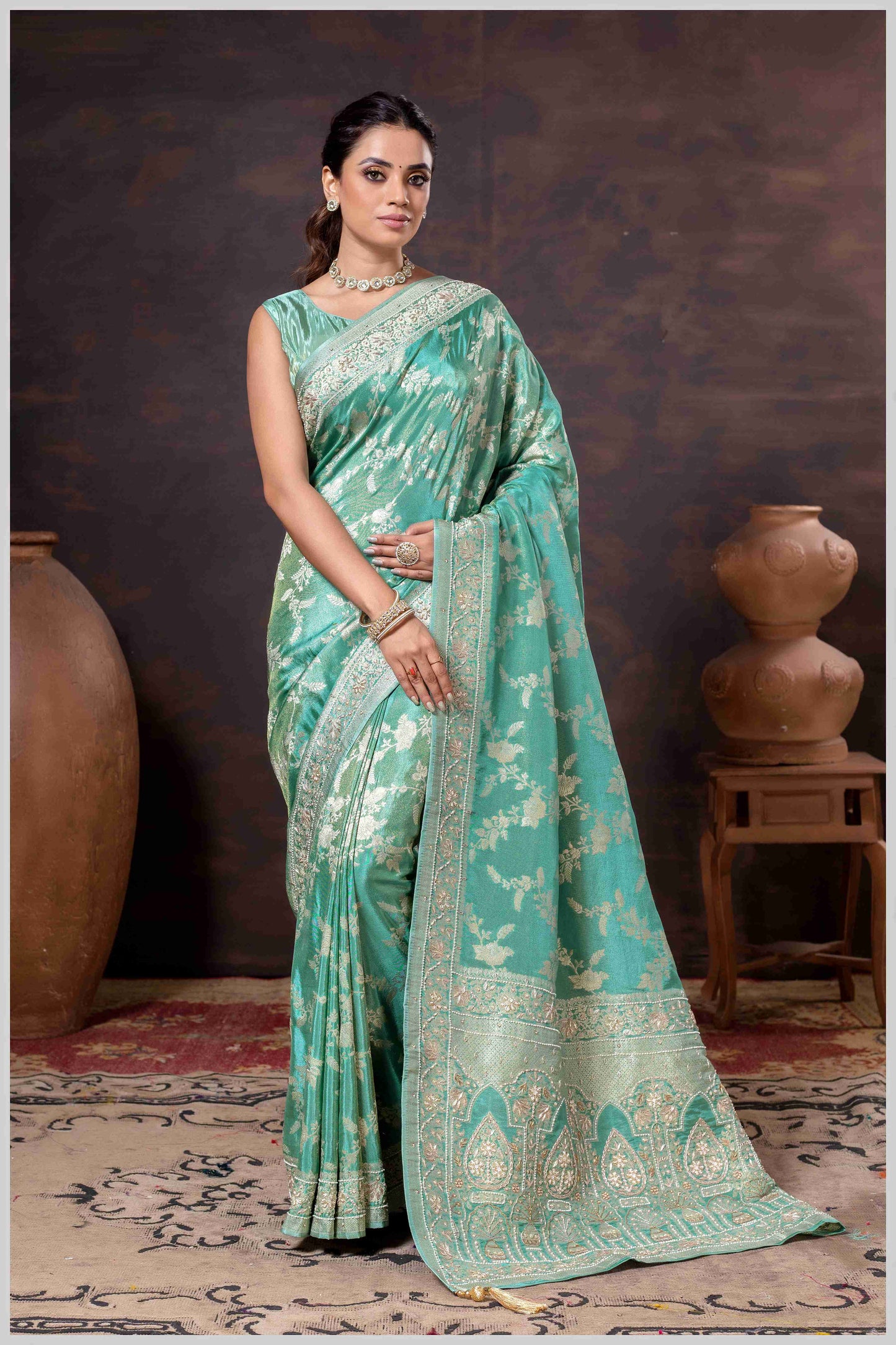 Grace in Bloom: Aqua Green Tissue Saree with Woven Floral Vines