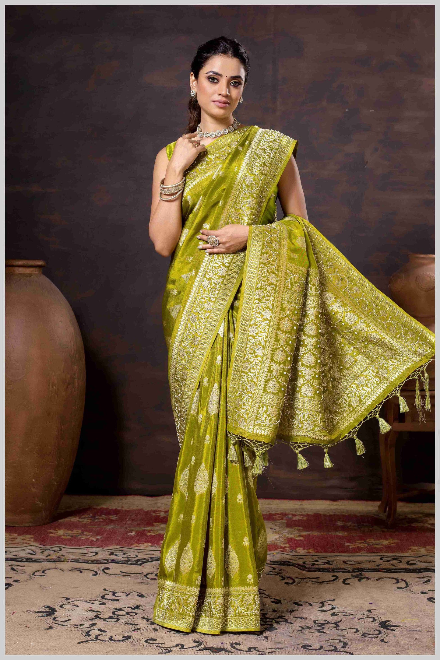 Mahendi Elegance: Tissue Silk Saree with Gold Zari Woven Details