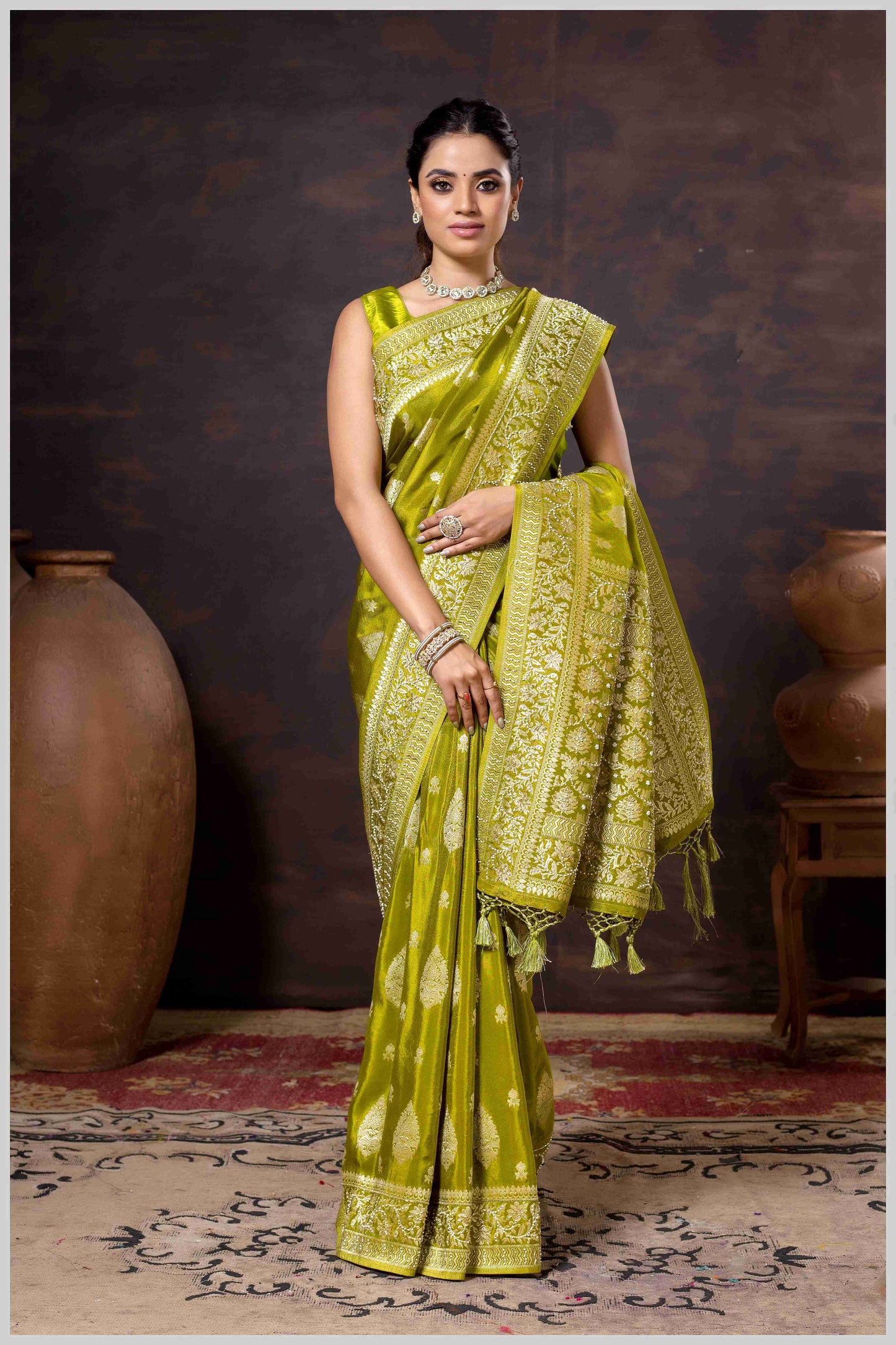 Mahendi Elegance: Tissue Silk Saree with Gold Zari Woven Details