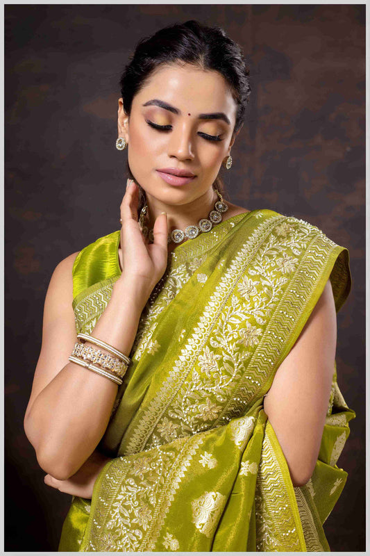 Mahendi Elegance: Tissue Silk Saree with Gold Zari Woven Details