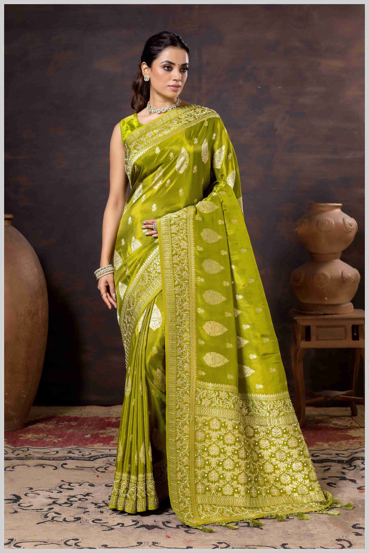 Mahendi Elegance: Tissue Silk Saree with Gold Zari Woven Details