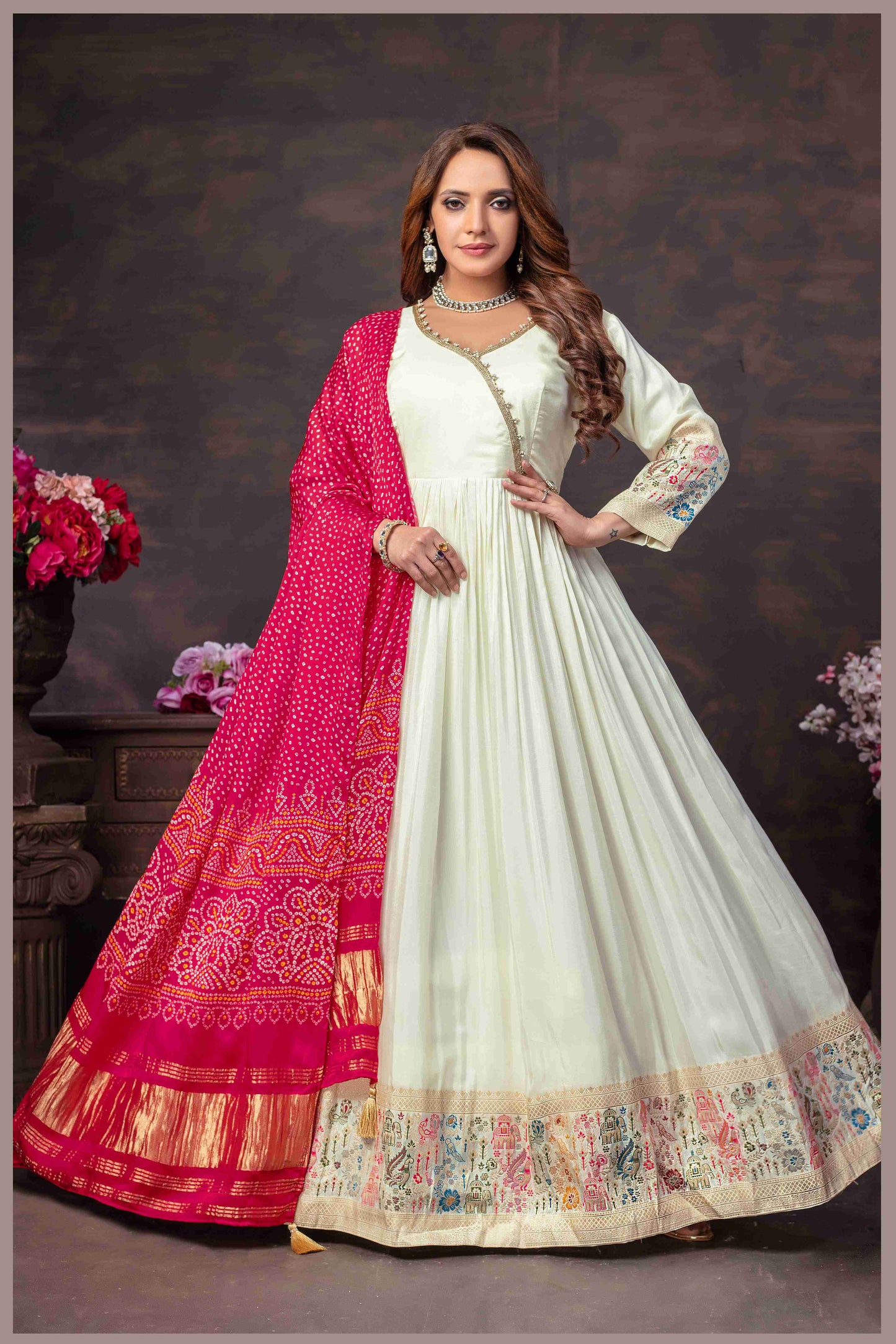 Off White Anarkali Gown with Traditional Bandhej pink Dupatta