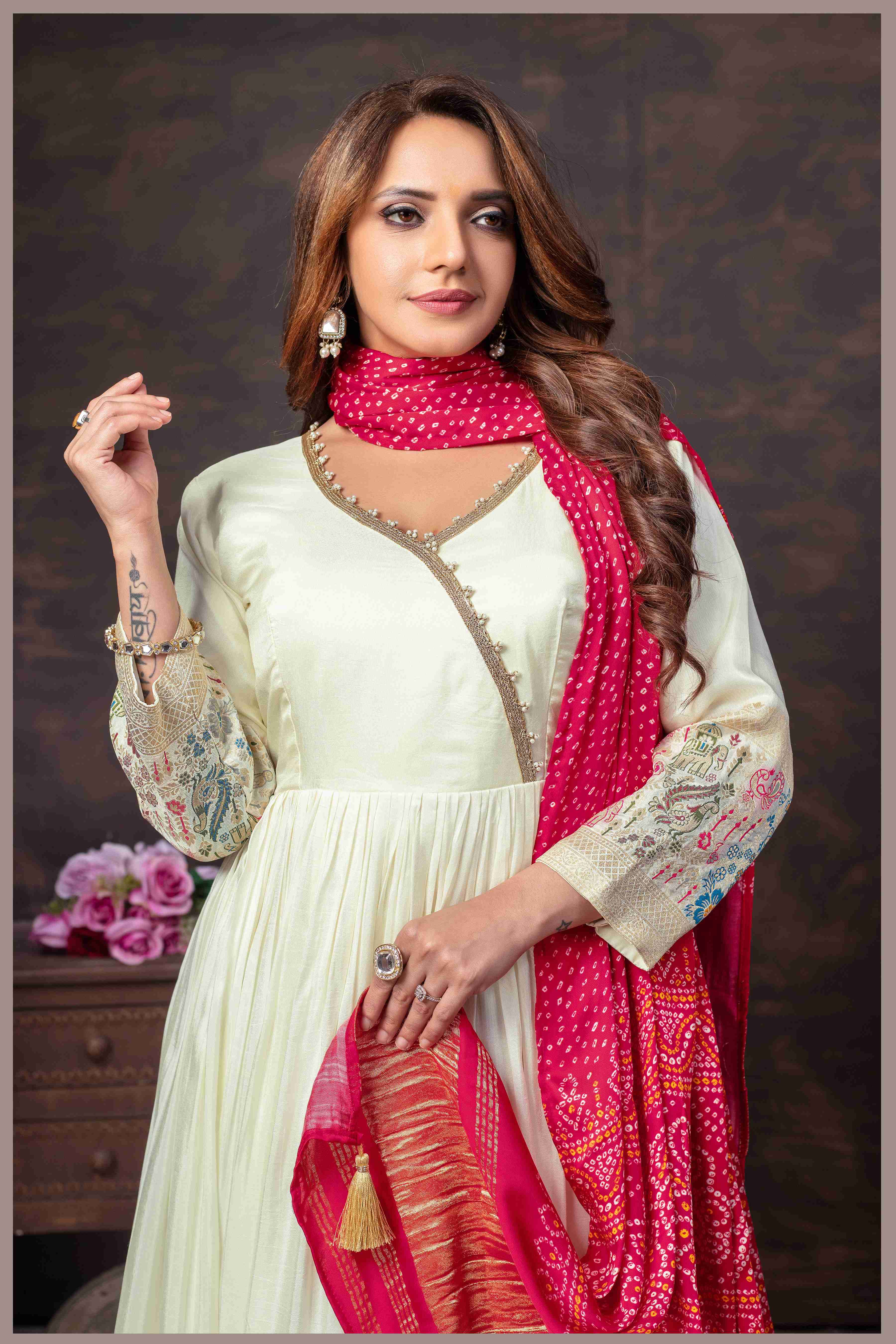 Off White Anarkali Gown with Traditional Bandhej pink Dupatta