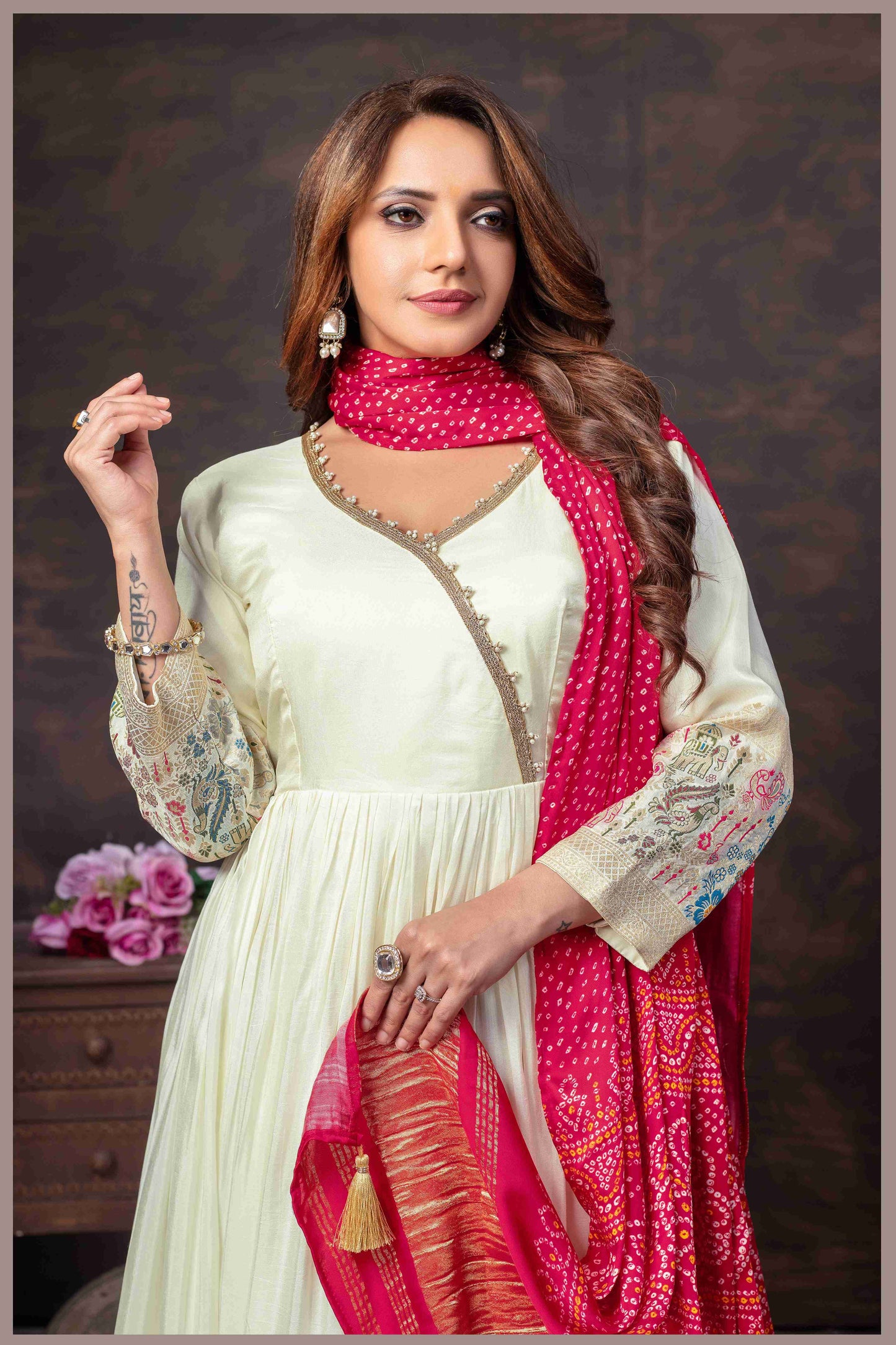 Off White Anarkali Gown with Traditional Bandhej pink Dupatta