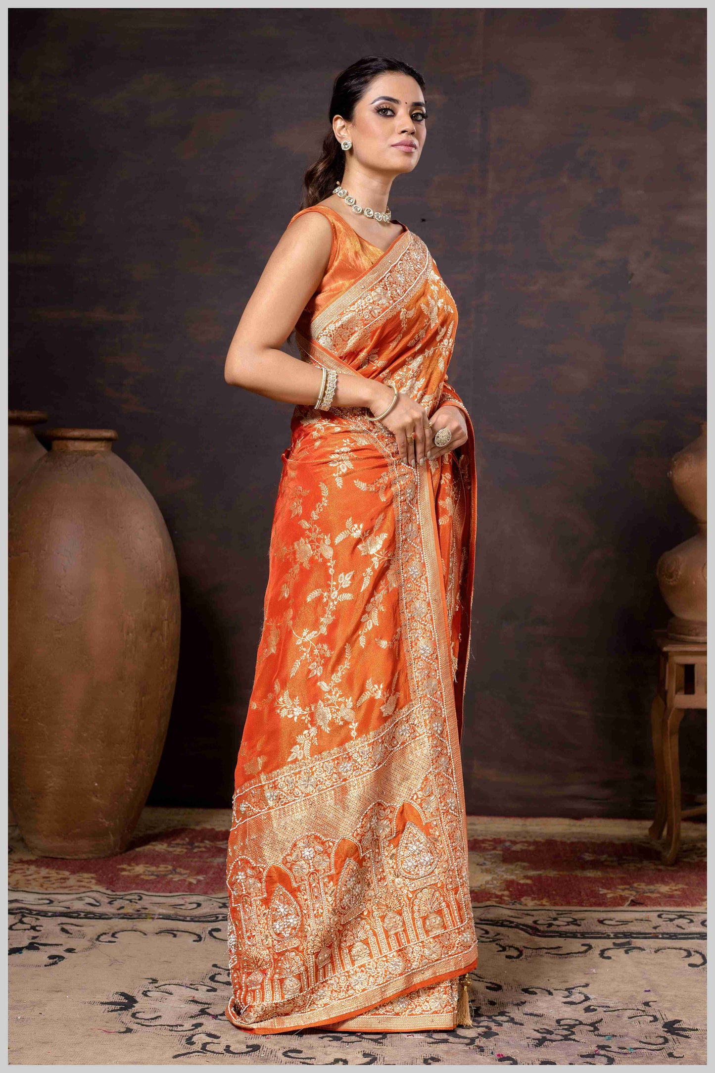 Grace in Bloom: Rust Orange Tissue Saree with Woven Floral Vines