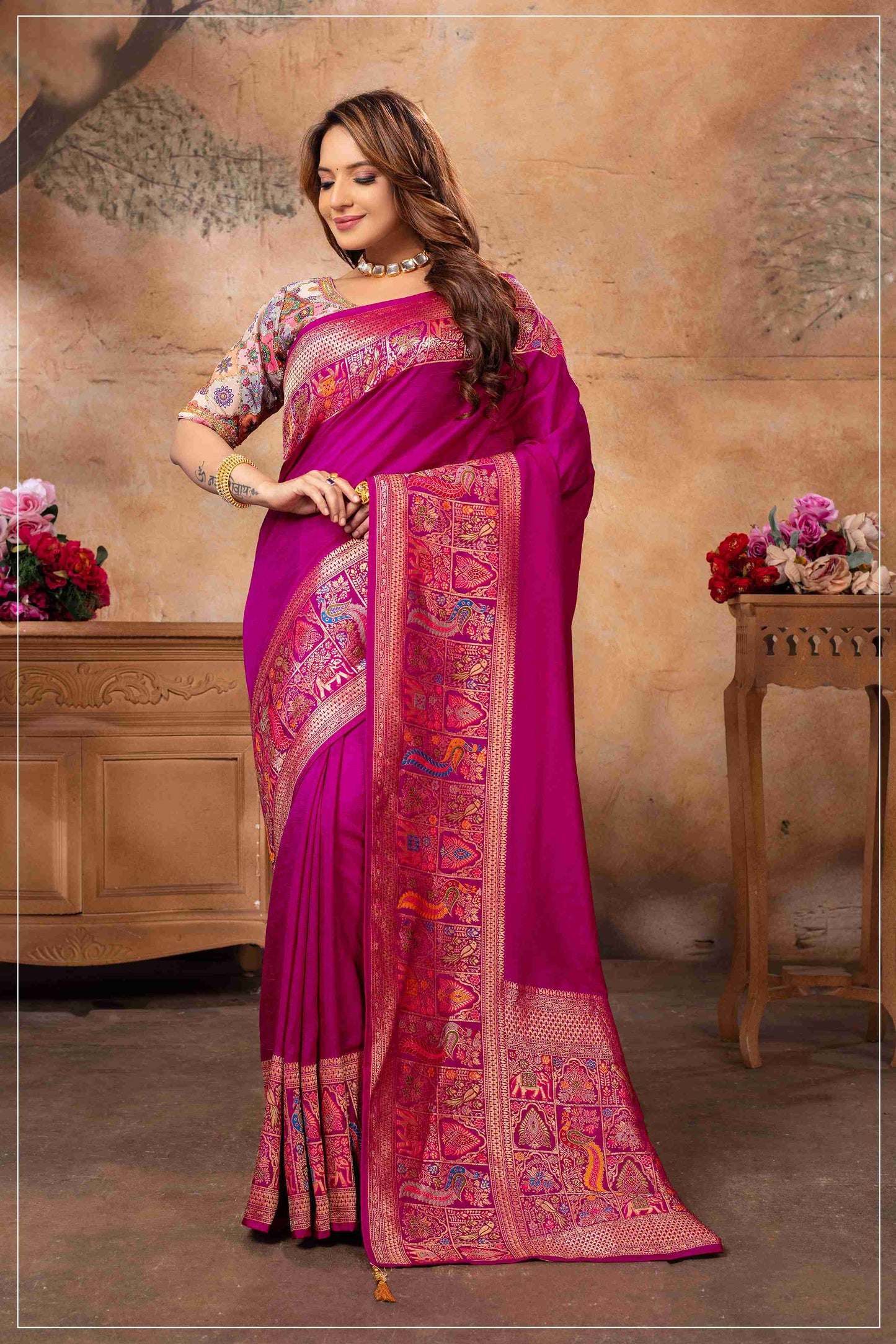 Majestic Rani Pink Saree with Multicolor Blouse.
