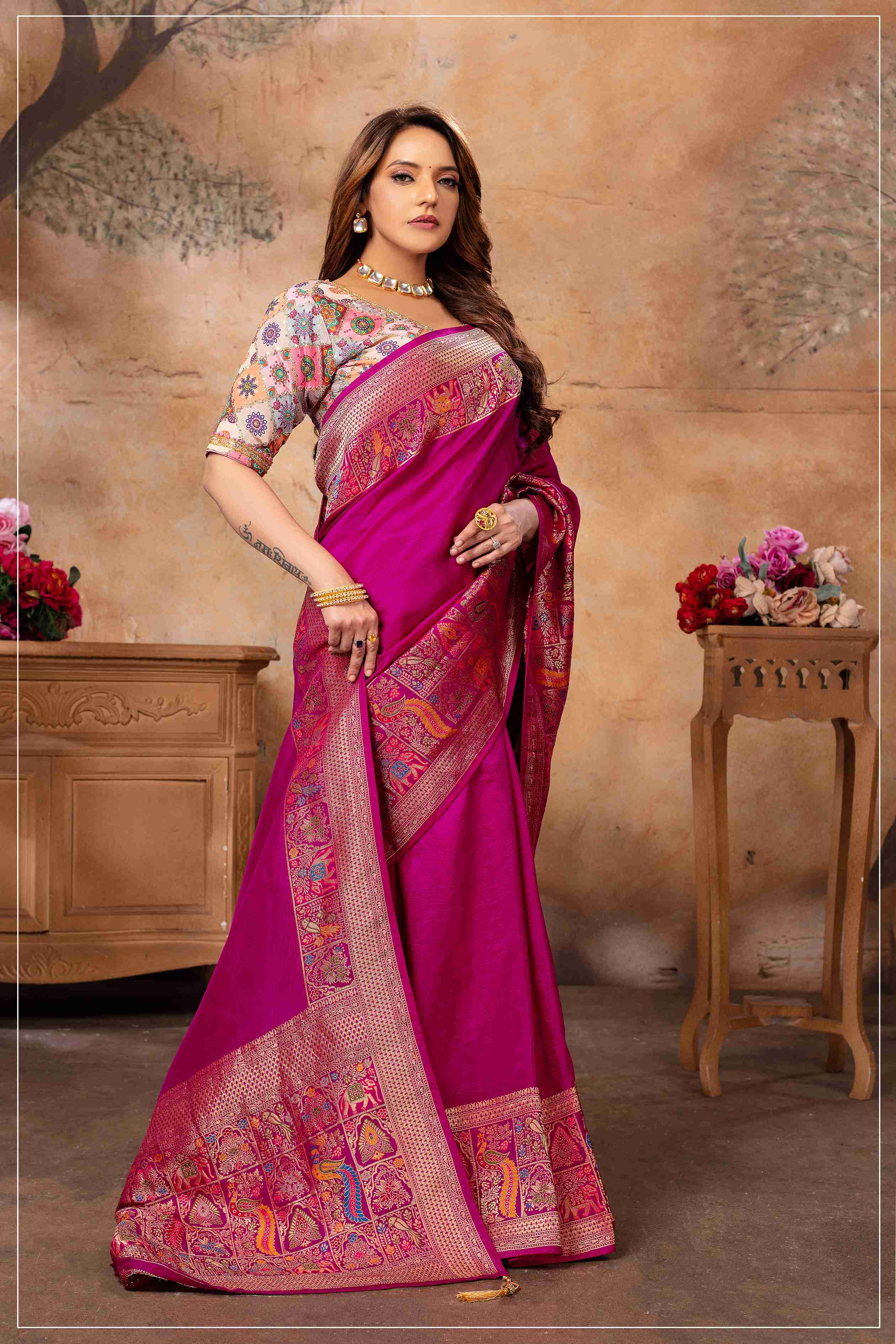 Majestic Rani Pink Saree with Multicolor Blouse.