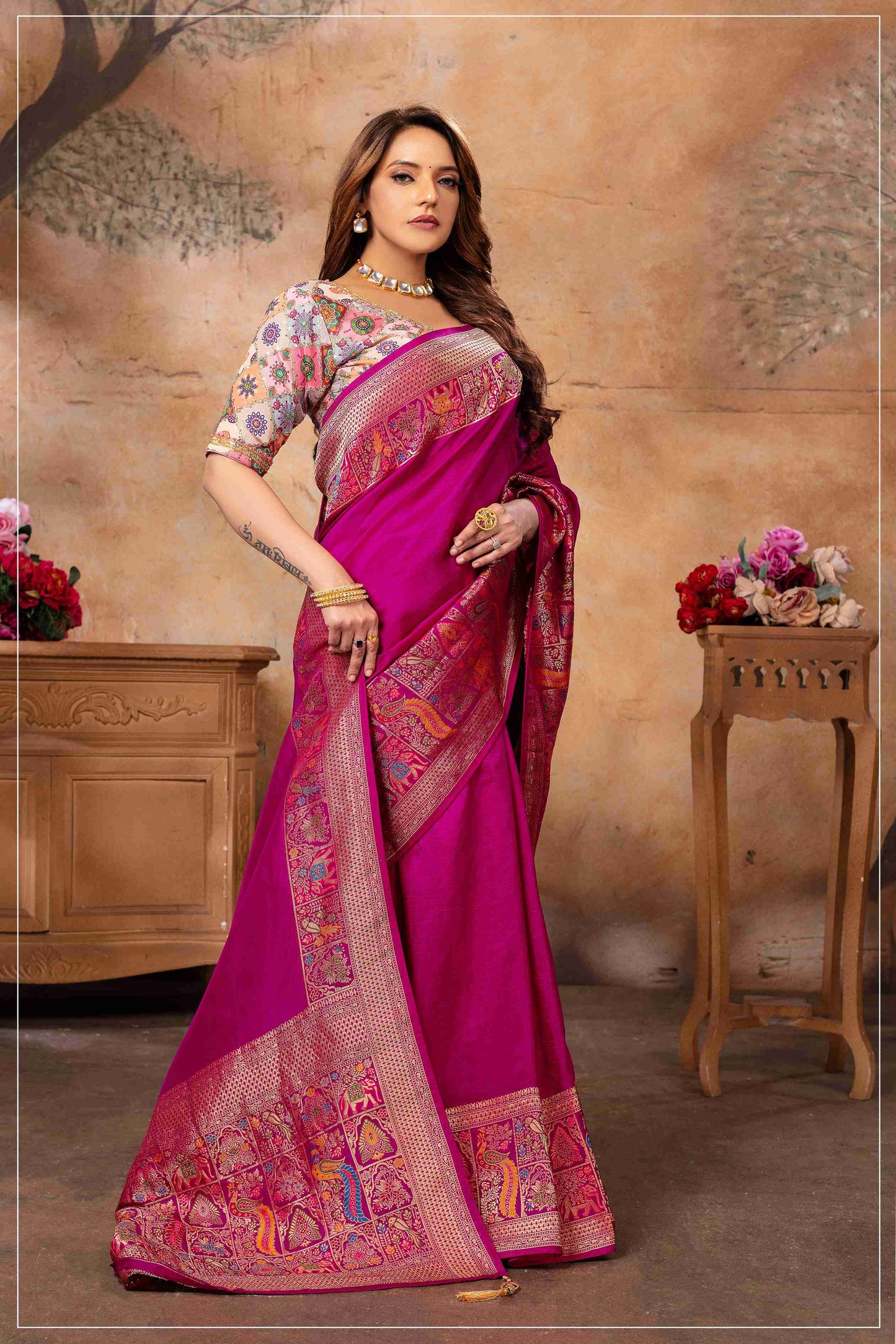 Majestic Rani Pink Saree with Multicolor Blouse.