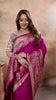 Majestic Rani Pink Saree with Multicolor Blouse.