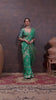 Elegant Green Banarasi Silk Saree with Floral Zari Weaving & Designer Blouse