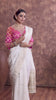 Royal Radiance: Off White Banarasi Saree & Pink Blouse with Silver Zari Detailing