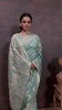 Grace in Bloom: Aqua Green Tissue Saree with Woven Floral Vines