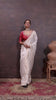 Elegant off-white Banarasi Silk Saree with Floral Zari Weaving & Designer Blouse